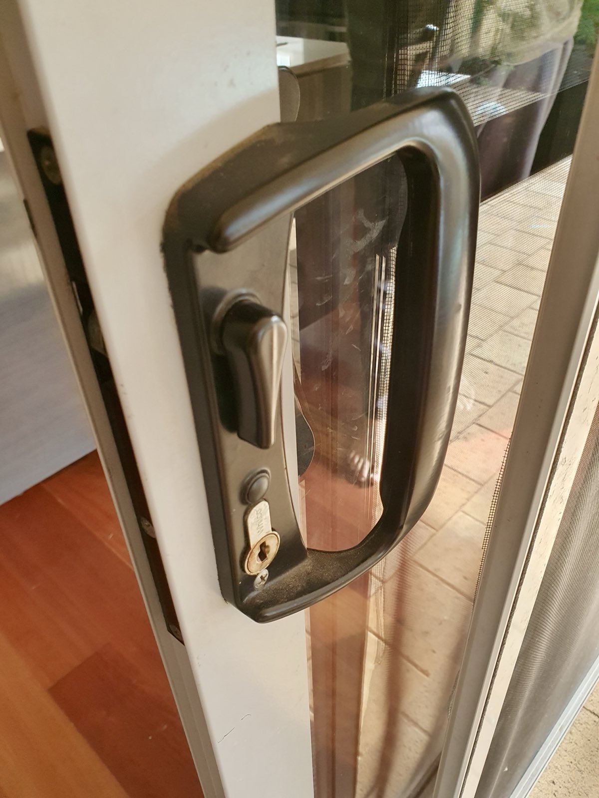 Replaced sliding patio door handle and lock